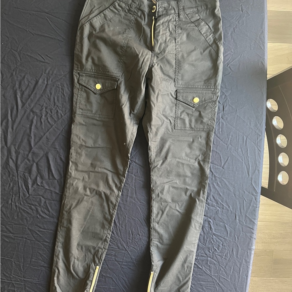 Jaanuu black scrub pants with gold colored zipper hardware cargo-extra small